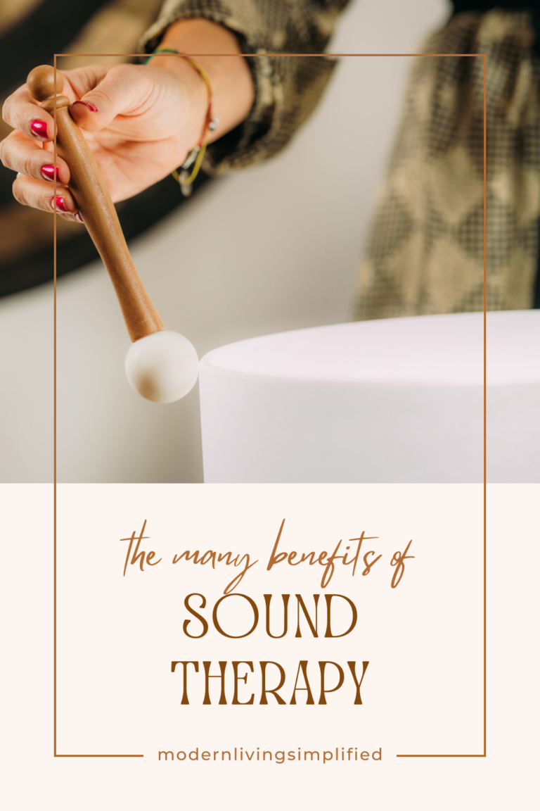 A person playing a singing bowl to experience the benefits of sound therapy
